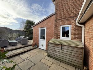 Side to rear garden- click for photo gallery